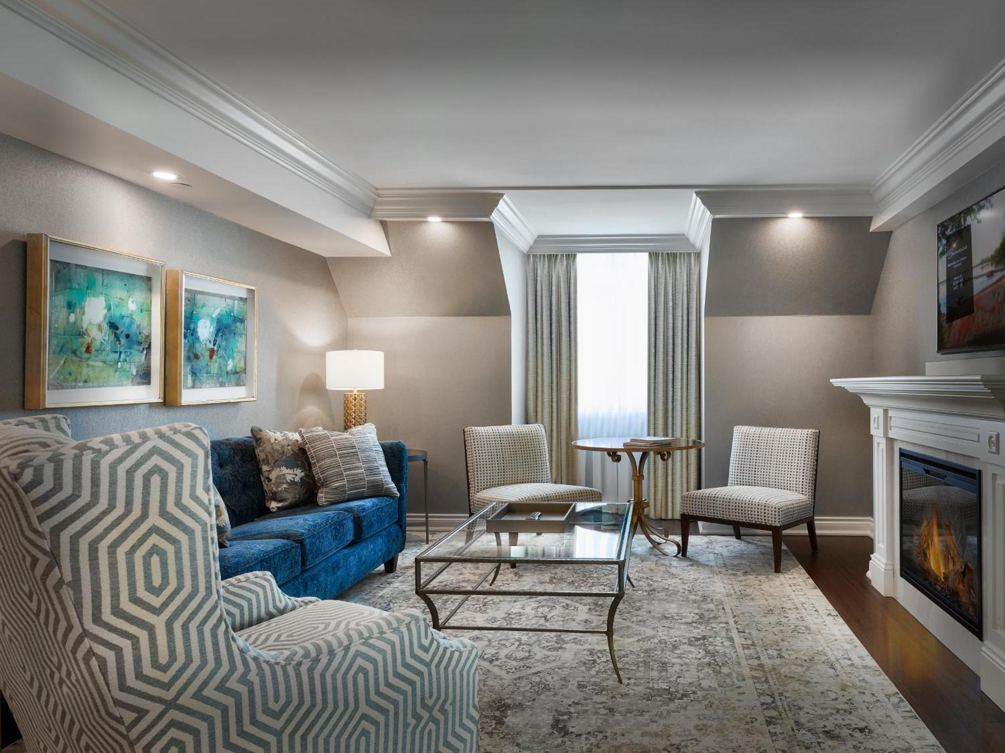 Chateau Vaudreuil ภายนอก รูปภาพ A living room at the hotel